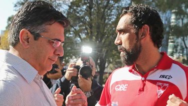 Adam Goodes of the Sydney Swans and AFL CEO Andrew Demetriou after speaking to the media during an AFL press conference.