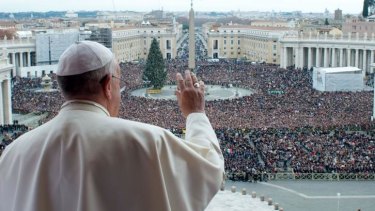 Pope Francis during his traditional Christmas "Urbi et Orbi" blessing from the balcony of St Peter's Basilica at the Vatican. 