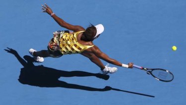 'Surprise in a tennis dress' ... Venus Williams makes a forehand return to Sandra Zahlavova during her second round match