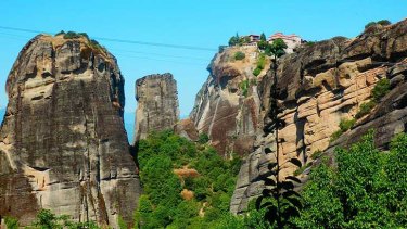 The Meteora 'suspended in the air' monasteries in central Greece were built atop towering natural sandstone pillars that peak at more than half a kilometre high.