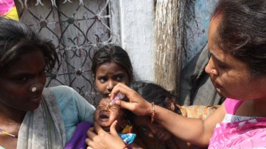 Polio-free ... it's been one year since the last reported case of the disease in India. Four-month-old Krishna is vaccinated against polio in northern India.