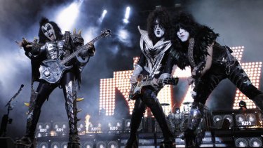Gene Simmons, Tommy Thayer and Paul Stanley of rock band Kiss perform during a concert on their Latin America tour.