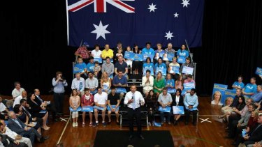 Opposition leaderTony Abbott speaks to party faithful at an election rally at Auburn Basketball Center in Sydney.