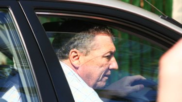 Resigned after sex scandal .. .John Della Bosca leaves his Central Coast home yesterday morning.
