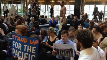 About 80 people occupy ANZ headquarters to protest the bank's financing of new fossil fuel and its impact on Pacific Islands.