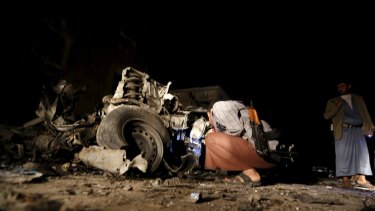 Car bomb wreckage in Sanaa on Wednesday. 