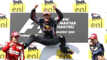 Good times ... Mark Webber celebrates winning the Hungarian Grand Prix.