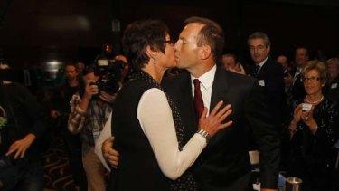 Tony Abbott kisses his wife Margie at the Liberal Party conference in Perth.