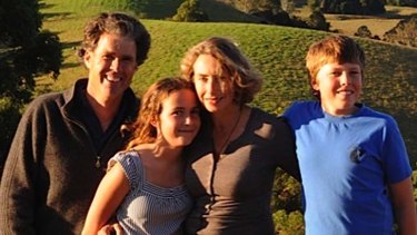 Fighters ... Bruce and Belinda  Robertson with their family.