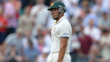 Racism row: Australia's Usman Khawaja walks off after being given out during play on the first day of the third Ashes cricket test match between England and Australia.