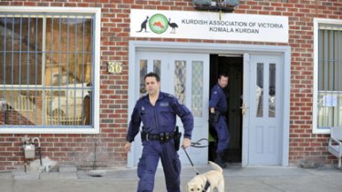 AFP officers raid the Kurdish Association of Victoria in Pascoe Vale yesterday.