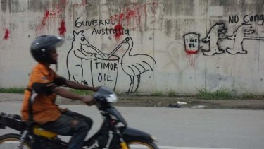 Australia embassy in East Timor showing a vandal attack on an adjacent wall.