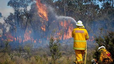 NSW fire crews fight the State Mine fire.