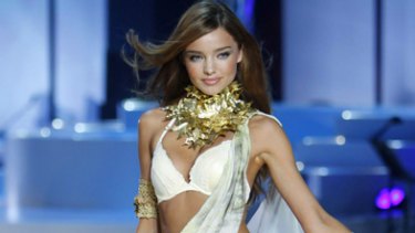 Miranda Kerr walks the runway at the Victoria's Secret Fashion Show last year. the retailer is among those gearing up offer shoppers the chance to purchase fashion over their mobiles. Picture: REUTERS.
