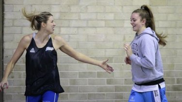 Canberra Capitals' Carly Wilson, left, and Abbey Wehrung at training.