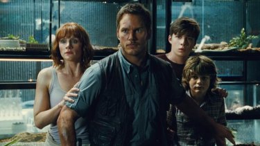 Bryce Dallas Howard (from left) as Claire, Chris Pratt as Owen, Nick Robinson as Zach, and Ty Simpkins as Gray in <i>Jurassic World</i>.