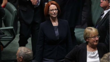 Prime Minister Julia Gillard exits the chamber after a division in the lower house on Tuesday night.
