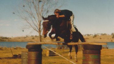 Mears, age 14, jumping one of her horses at her childhood home in Grafton.