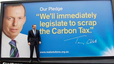 Backtrack ... Tony Abbott has admitted that the carbon tax is a "python squeeze rather than a cobra strike."