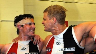 Lenny Hayes and Nick Riewoldt celebrate a victory over Geelong during the 2010 finals series.