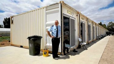 Shipping containers are being used as prison cells at the Dhurringile Prison near Shepparton.
