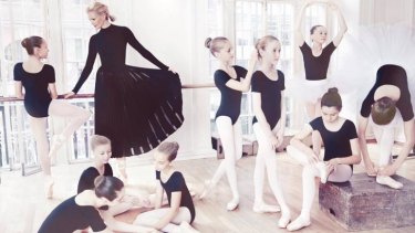 Former model and ballerina Sarah Murdoch poses with ballet students in her latest fashion spread for Vogue.