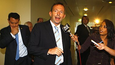 New Opposition Leader Tony Abbott emerges triumphant from the Liberal Party Room after defeating Malcolm Turnbull by one vote.