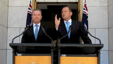 Education Minister Christopher Pyne and Prime Minister Tony Abbott address the media at Parliament House.