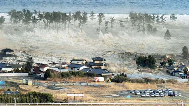 The tsunami-devastated Natori city in Miyagi prefecture is seen in these images taken March 11, 2011 (top) and March 1, 2012.