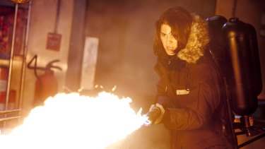 It's a Hollywood rule - aliens don't like chicks with flamethrowers: Mary Elizabeth Winstead plays Dr Lloyd, a nerdy scientist whose mean streak is brought out by the titular critter in <i>The Thing</i>.
