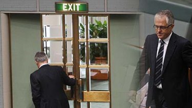 Malcolm Turnbull crosses the floor before leaving the chamber.
