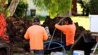 Building the national broadband network will require less than half as many workers as originally forecast.