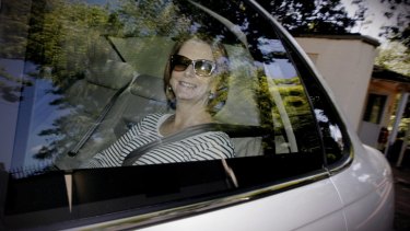 Labouring: Prime Minister Julia Gillard is seen leaving The Lodge yesterday.