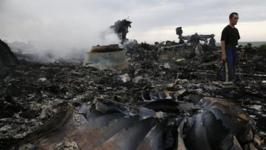 Still littered with bodies: the crash site of Malaysia Airlines flight 17.