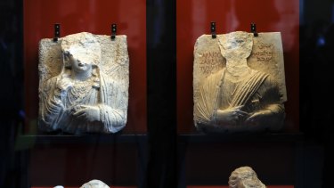 Two defaced busts recovered from Palymra on display in Rome at an exhibition called "Reborn from the Destructions".