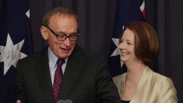 Former NSW premier Bob Carr with Julia Gillard.