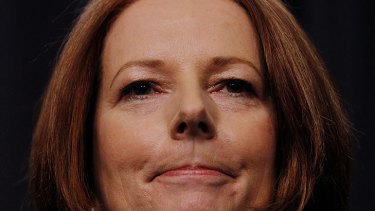 Historic day ... for Julia Gillard, who lost popularity after vowing before the election there would be no carbon tax under her government.