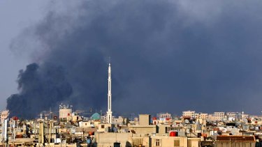 Audacious attack &#8230; smoke billows over Damascus after the explosion that killed senior figures in the Assad regime, including the Defence Minister and his deputy, on Wednesday.