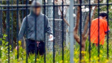 Inmates at Melbourne immigration transit accommodation in Broadmeadows on Sunday. (Digitally altered image)
