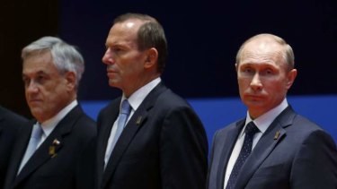 "Of utmost importance to all of us": Vladimir Putin (right), with Tony Abbott and Chile's President Sebastian Pinera at the APEC Summit.