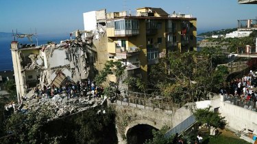 The partially collapsed building in Torre Annunziata.