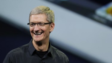 Apple CEO Tim Cook announces the new iPad in San Francisco in March. Cook is revealing a confident and eloquent side as he starts to emerge from the shadow of Steve Jobs.