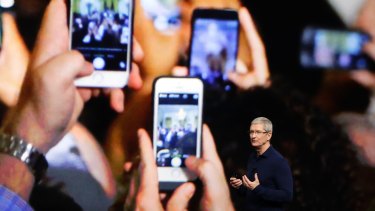 Apple CEO Tim Cook announcing the new iPhone 7 on Wednesday. 