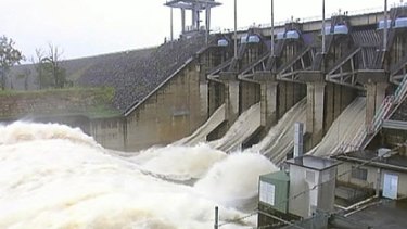 An overflowing Wivenhoe Dam yesterday.