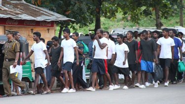 The latest batch of Sri Lankan deportees from Australia is led to court.