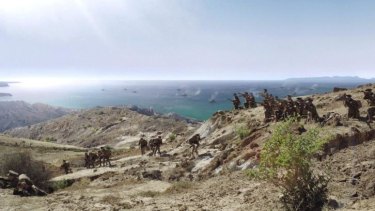 After digital effects: Anzac troops climb the heights of Gallipoli Peninsula.