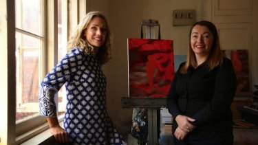 Artist Maz Dixon (right) in her Bondi Beach studio with Emilya Colliver, the director of The Other Art Fair, a new affordable art fair.