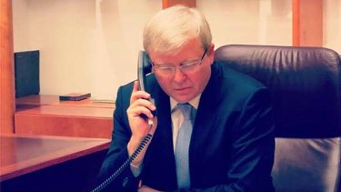 Australian Prime Minister Kevin Rudd on the phone with US President Barack Obama.
