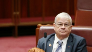 Senator Burston sits behind Senator Hanson. This week he was nominated as deputy in charge of the party's NSW campaign.