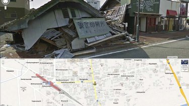 A collapsed house, with its location pinpointed on a map below, in Namie, Japan.